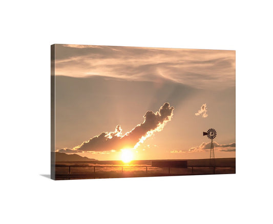 Sunset over a field with a windmill on a white background. Western Ranch Windmill Sunset Landscape Photography | San Rafael Valley AZ