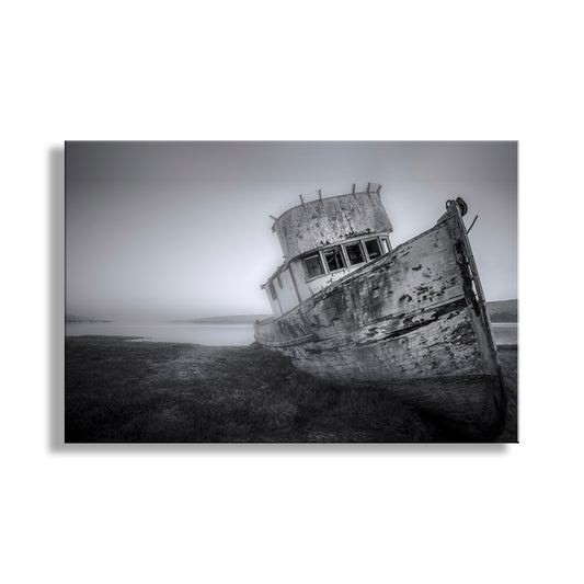 Rustic, abandoned boat on a beach with a gray sky. Old Boat Shipwreck Wall Art at Tomales Bay California Coast