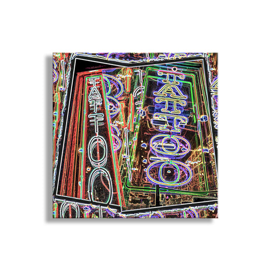 Neon sign with 'Tattoo' text on a white background. Neon Street Sign as Abstract Tucson AZ Urban Art of Tattoo Parlor