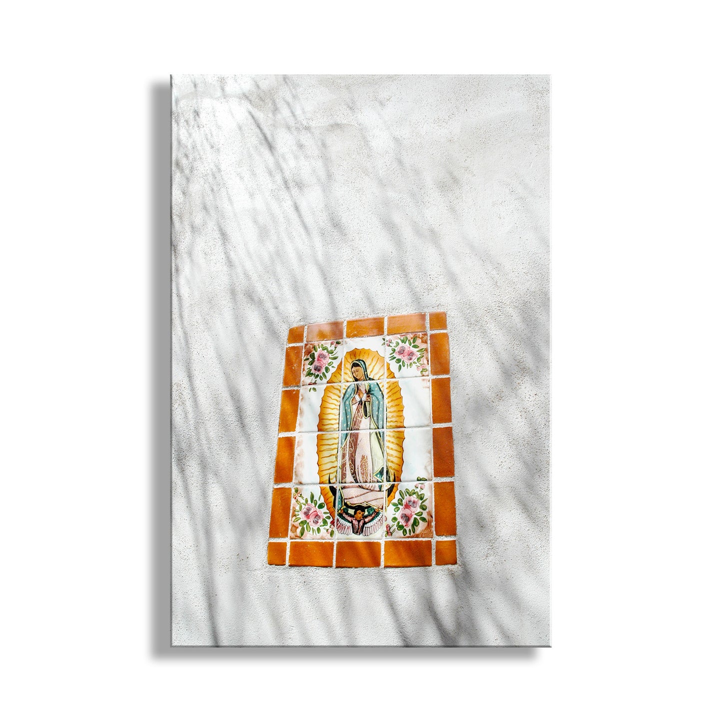 Decorative tile with a religious icon on a marble surface. Tucson Art San Xavier Mission Canvas Framed Print with Virgin of Guadalupe