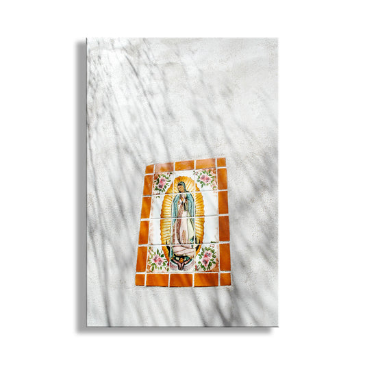 Decorative tile with a religious icon on a marble surface. Tucson Art San Xavier Mission Canvas Framed Print with Virgin of Guadalupe