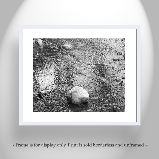 Framed black and white print of a stone in water on a gray background. Madera Canyon AZ Mountain Creek Fine Art Water Photograph in B&W