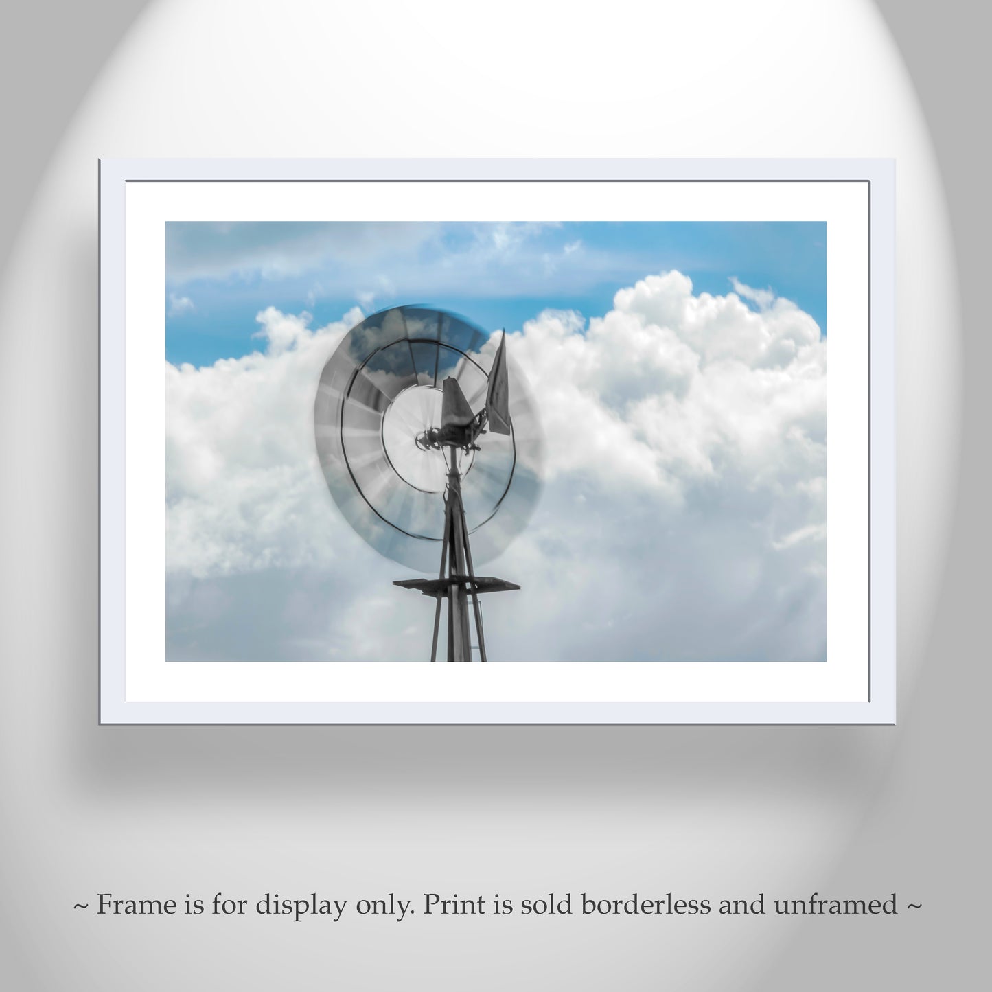 Framed print of a windmill against a blue sky with clouds. Farm Windmill Photograph with Southern Arizona Stormy Sky & Clouds