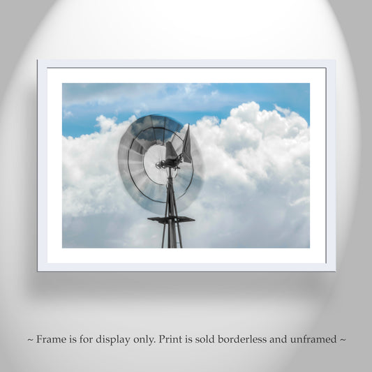 Framed print of a windmill against a blue sky with clouds. Farm Windmill Photograph with Southern Arizona Stormy Sky & Clouds