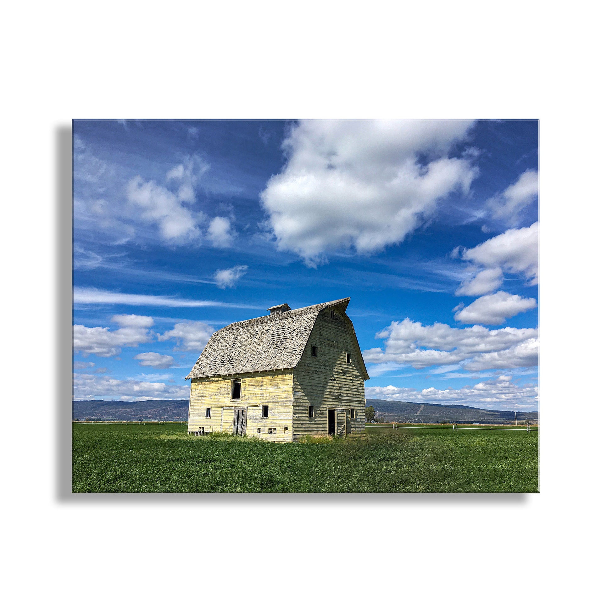 To embellish your walls, my cool barn photograph from Modoc County California farm country USA! This unusual yellow barn is a vivid highlight in a flat fertile farming basin. Original, unique signed art by Murray Bolesta.
