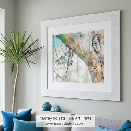 A close-up view of a tree branch with a bird perched on it, set against a blurred background of a flying bird, and more branches and twigs. Acorn Woodpecker Bird Wall Art - Arizona Forest Nature Decor Print by Murray Bolesta