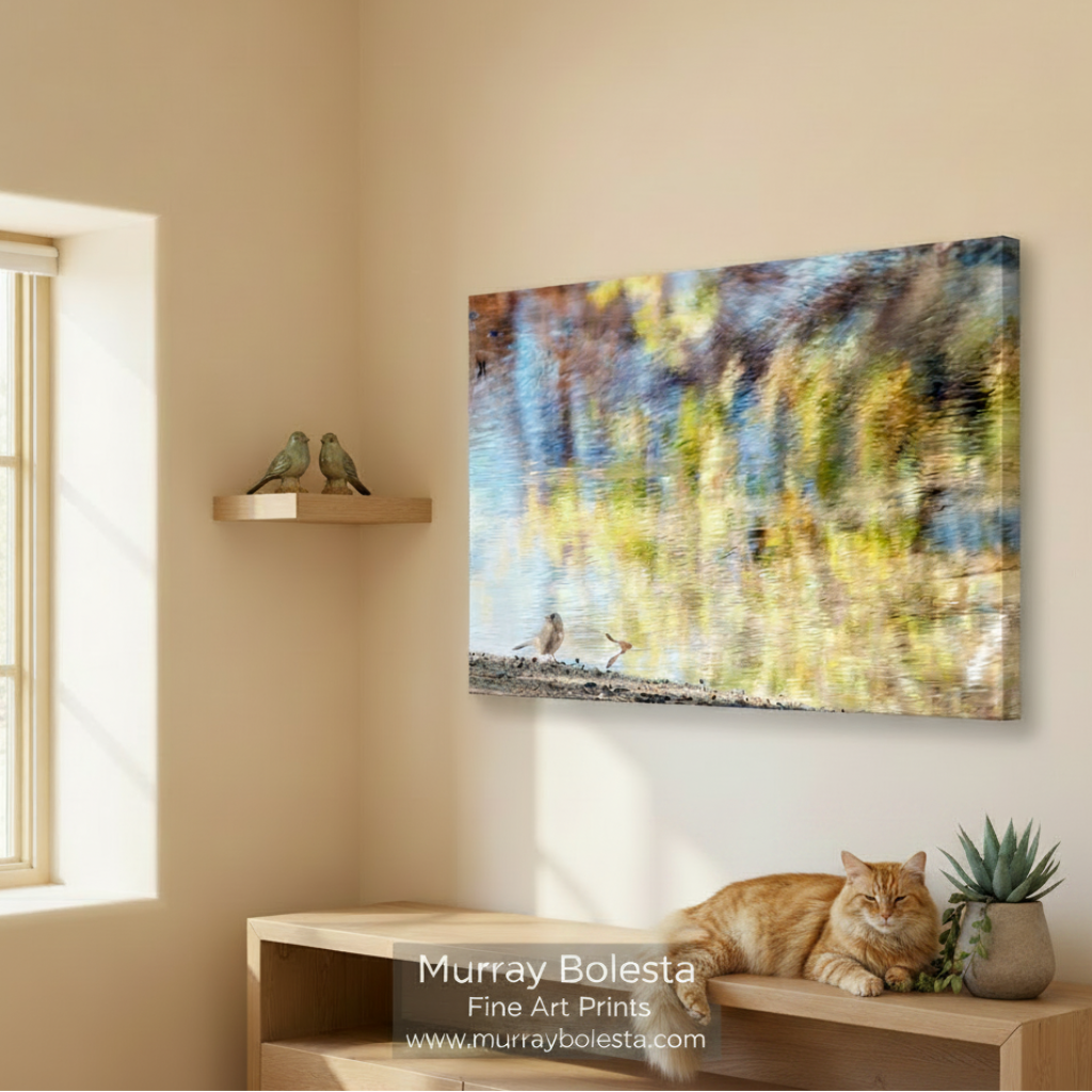 A blurry, colorful landscape with a bird standing on the ground near a body of water. Painterly Bird & Water Reflections - Arizona Fall Colors Art Print by Murray Bolesta