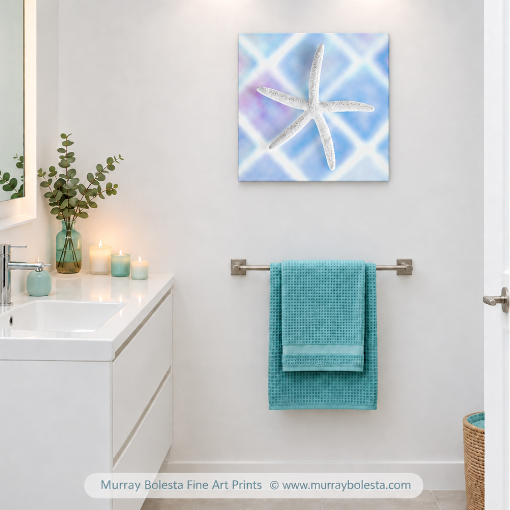 Bathroom art with white starfish on blue background, by Murray Bolesta
