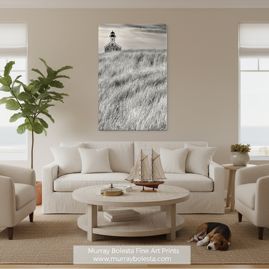 A sepia photograph of a lighthouse standing in a field of tall grass. Block Island Lighthouse Art Print | Rhode Island Beach Grass Decor, by Murray Bolesta!