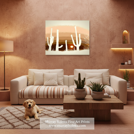A framed wall art print showing white cacti against a warm sunset landscape, displayed above a beige sofa in a styled living room with a dog on a rug and a coffee table.