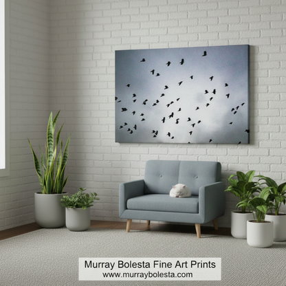 Canvas print of a flock of birds flying against a gray sky  - Surreal art by Murray Bolesta