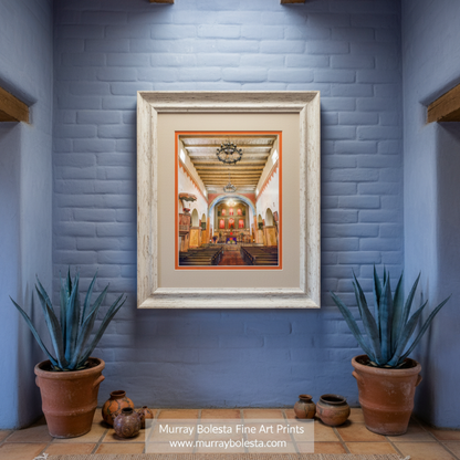 a large, ornate church interior with high ceilings, arched doorways, and a central altar with a large cross. Mission San Juan Bautista Interior Art Print – Historic Church Photo by Murray Bolesta