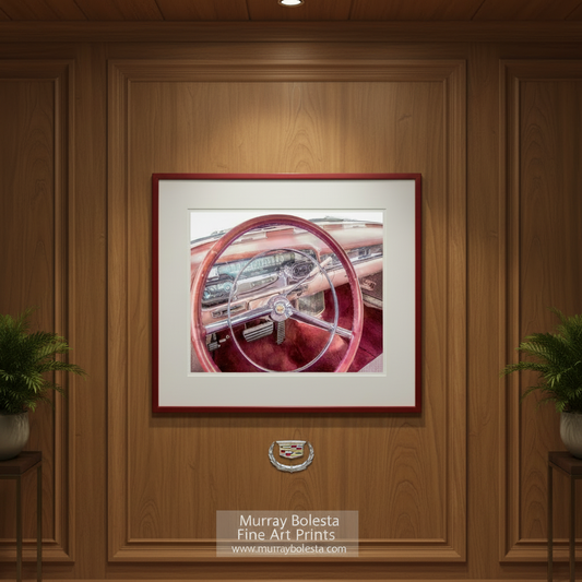 the interior of a classic car, focusing on the steering wheel and dashboard. Classic Cadillac Series 62 Art Print | Vintage Car Wall Decor by Murray Bolesta