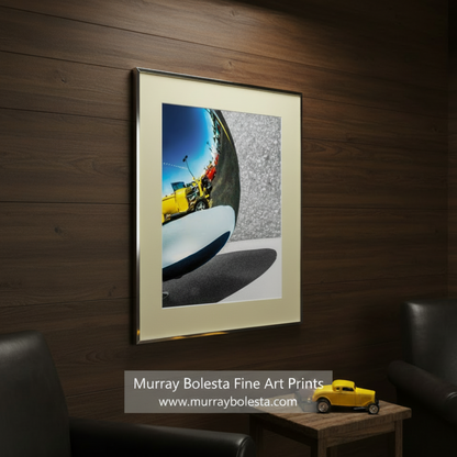 a reflective surface that captures a reflection of a yellow car and a red car, creating a visually interesting composition. Abstract Automotive Art with Vintage Hot Rod Car by Murray Bolesta