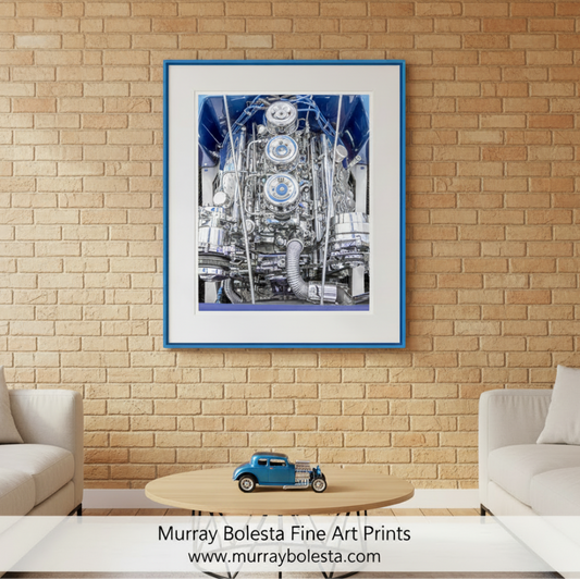a detailed view of a large, complex engine with various components and parts visible, including cylinders, pistons, and other mechanical parts. Automotive Wall Art with Chromed Hot Rod Car Engine by Murray Bolesta