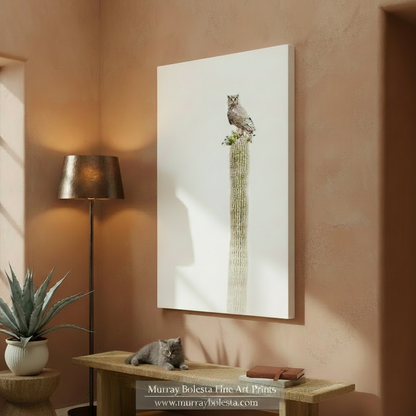 A brown owl perched on a tall, green cactus with small flowers. Owl on Saguaro Cactus - Minimalist Desert Wildlife Wall Decor by Murray Bolesta