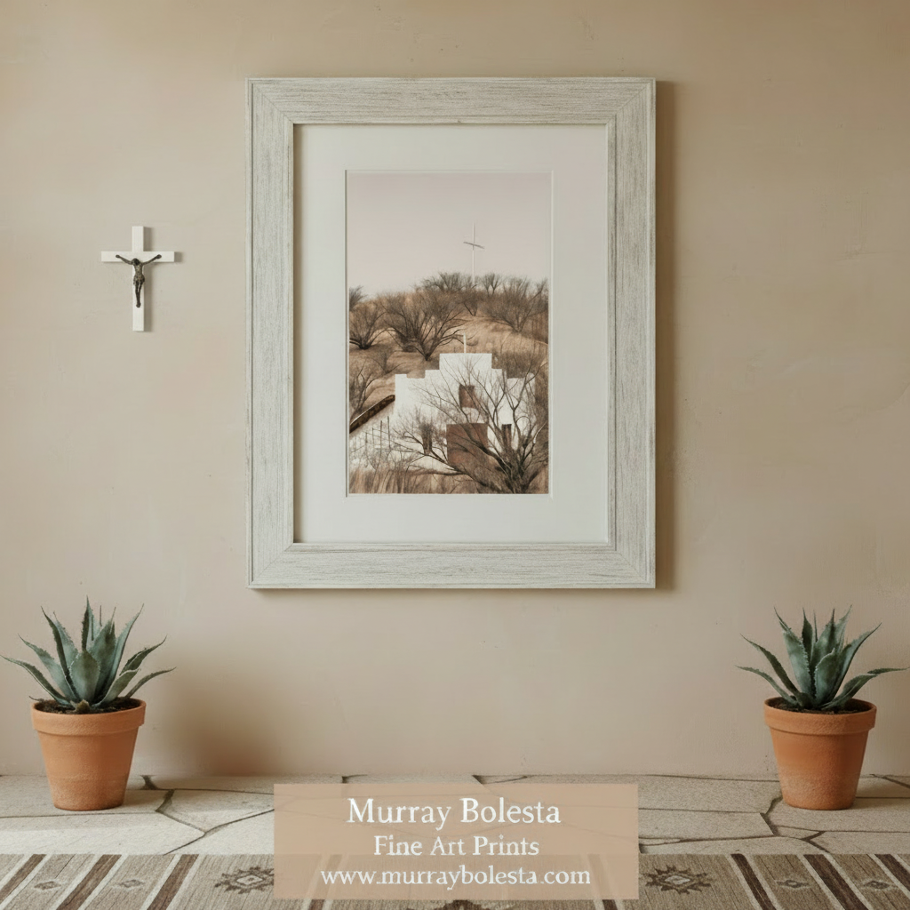 a white church with a cross on top, situated on a hill with a desert landscape in the background. Lochiel Arizona Church Art Print - Border Town Sepia Landscape by Murray Bolesta