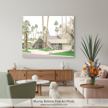 A modern, two-story house with a slanted roof, surrounded by palm trees and a paved driveway. Palm Springs Midcentury Modern Art | Architecture Photo Print by Murray Bolesta