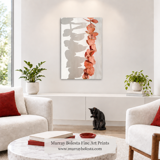 Minimalist white living room with a smaller frameless canvas and grooming black cat. Botanical art by Murray Bolesta