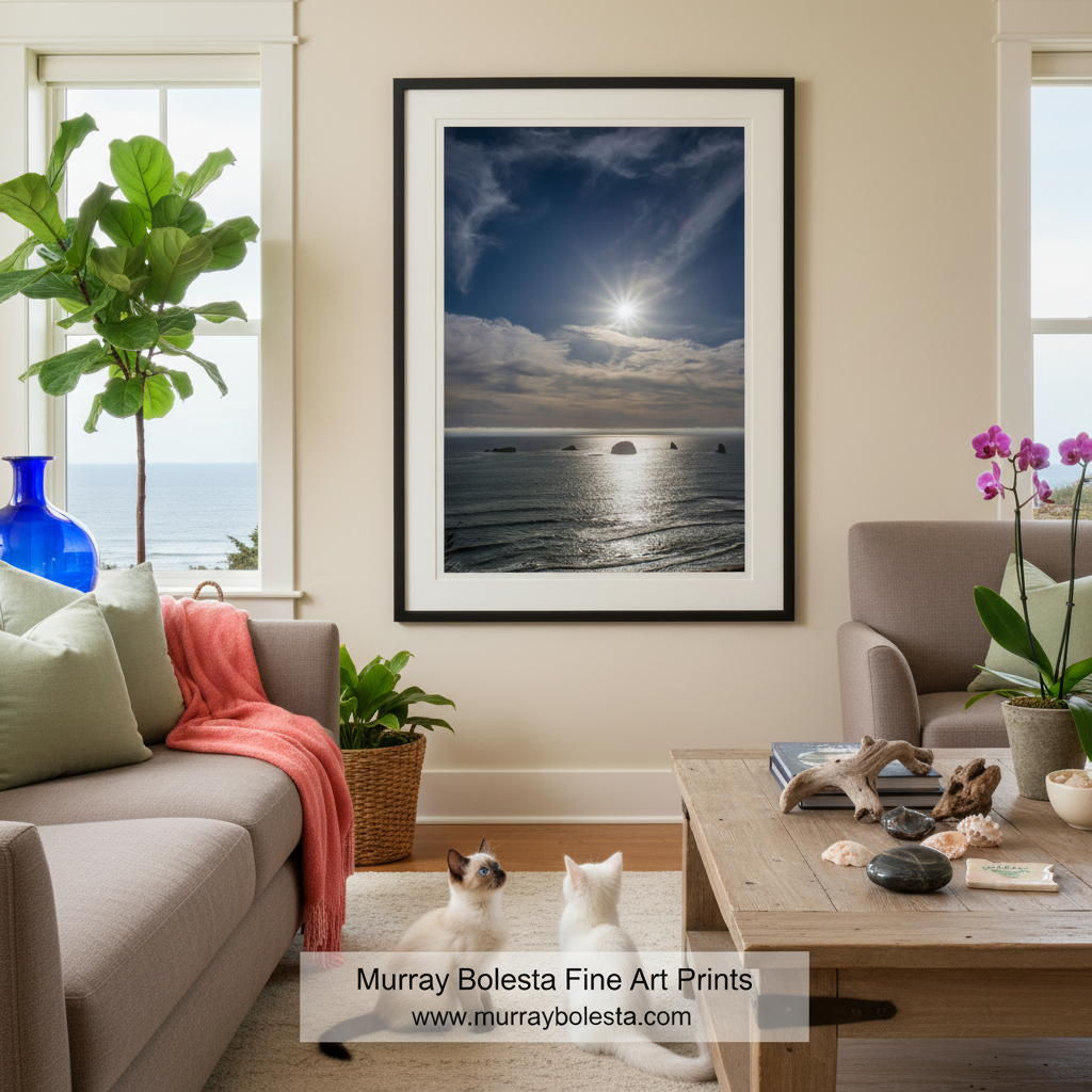 a serene ocean scene with a bright sun shining through the clouds, casting a warm glow on the water and the rocky shoreline. Oregon Coast Sunset Art | Port Orford Pacific Ocean Beach Print by Murray Bolesta!