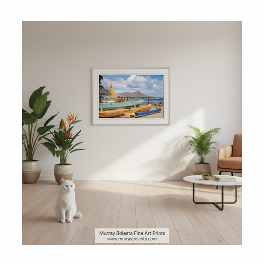 A framed art print depicting colorful boats on a beach is displayed on a light beige wall in a modern living room setting with a white cat, potted plants, and a coffee table. The brand name 'Murray Boleta Fine Art Prints' is visible at the bottom.