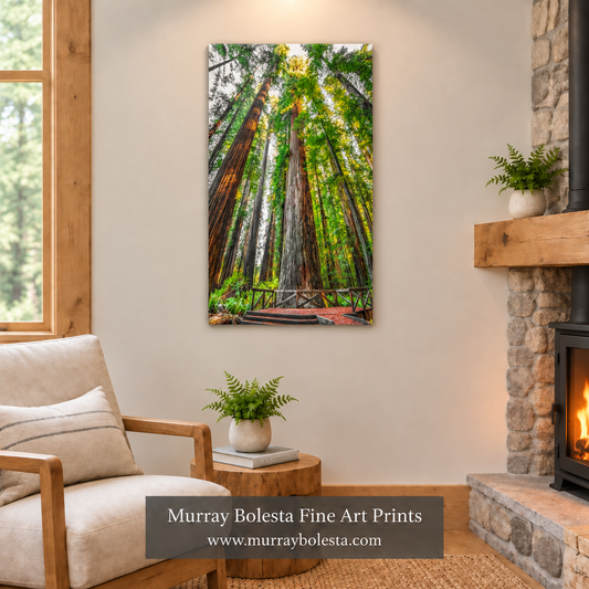 Mountain-cabin den with a smaller canvas, warmer artwork lighting, and a glowing fireplace. Redwoods art by Murray Bolesta