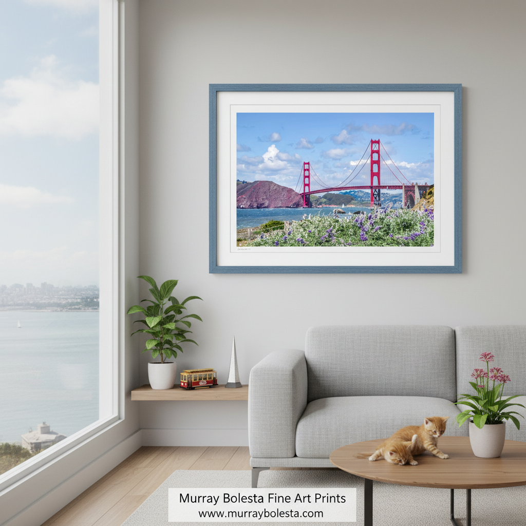 a large suspension bridge with two towering red towers, spanning across a body of water surrounded by a lush green landscape with purple flowers. Golden Gate Bridge with Sailboat & Baker Beach Wildflowers by Murray Bolesta!