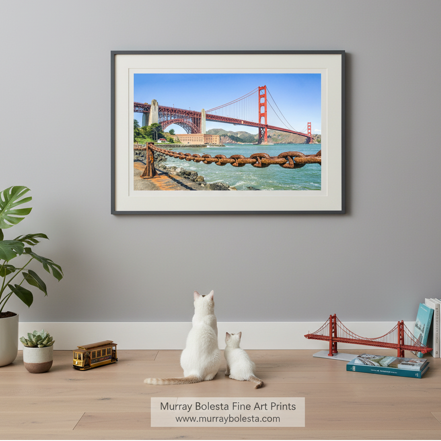 the iconic Golden Gate Bridge spanning the San Francisco Bay, with its distinctive red towers and suspension cables. The bridge is shown from a distance, providing a panoramic view of this famous landmark.Fort Point San Francisco with Golden Gate Bridge | Presidio Art by Murray Bolesta!