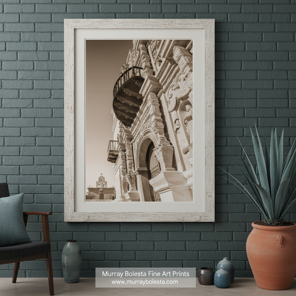 A sepia photograph of a historic building with intricate architectural details, including a balcony and ornate carvings. San Xavier del Bac Mission Art - Tucson Arizona Church Print by Murray Bolesta