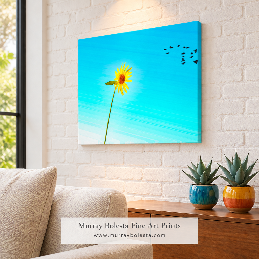 Sunflower artwork as an unframed canvas in an adobe-brick room by Murray Bolesta