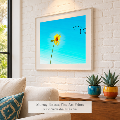 Sunflower artwork in a bright adobe-brick living-room mockup by Murray Bolesta