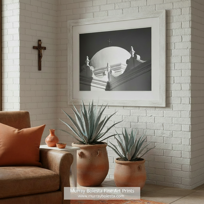 A black and white photograph of a domed building with a cross on top, captured in a low-light setting. San Xavier Mission Black & White Art - Tucson Arizona Church Print by Murray Bolesta
