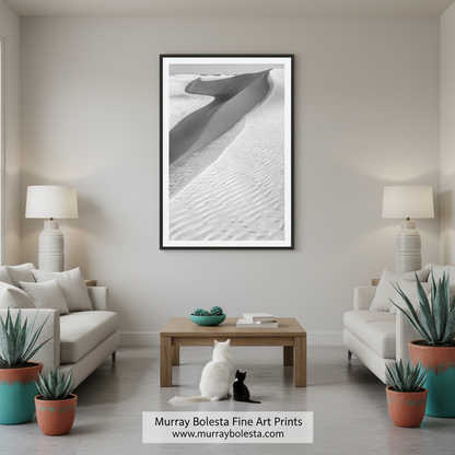 A black and white image of a sand dune with a curved, winding shape. Minimalist White Sands Desert Print - Elegant Southwest Nature Decor by Murray Bolesta!